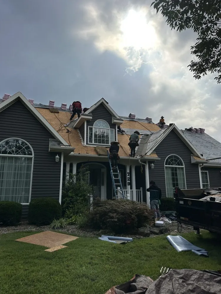 Slide of Overton Roofing