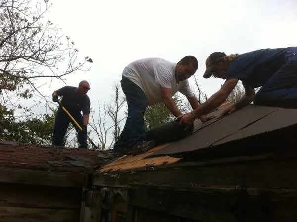 Slide of Owasso Roofing