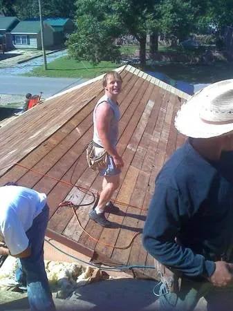 Slide of Owasso Roofing