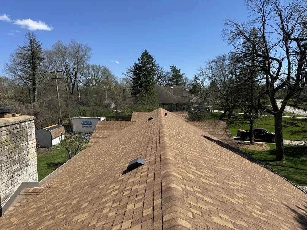 Slide of Owl Peak Roofing