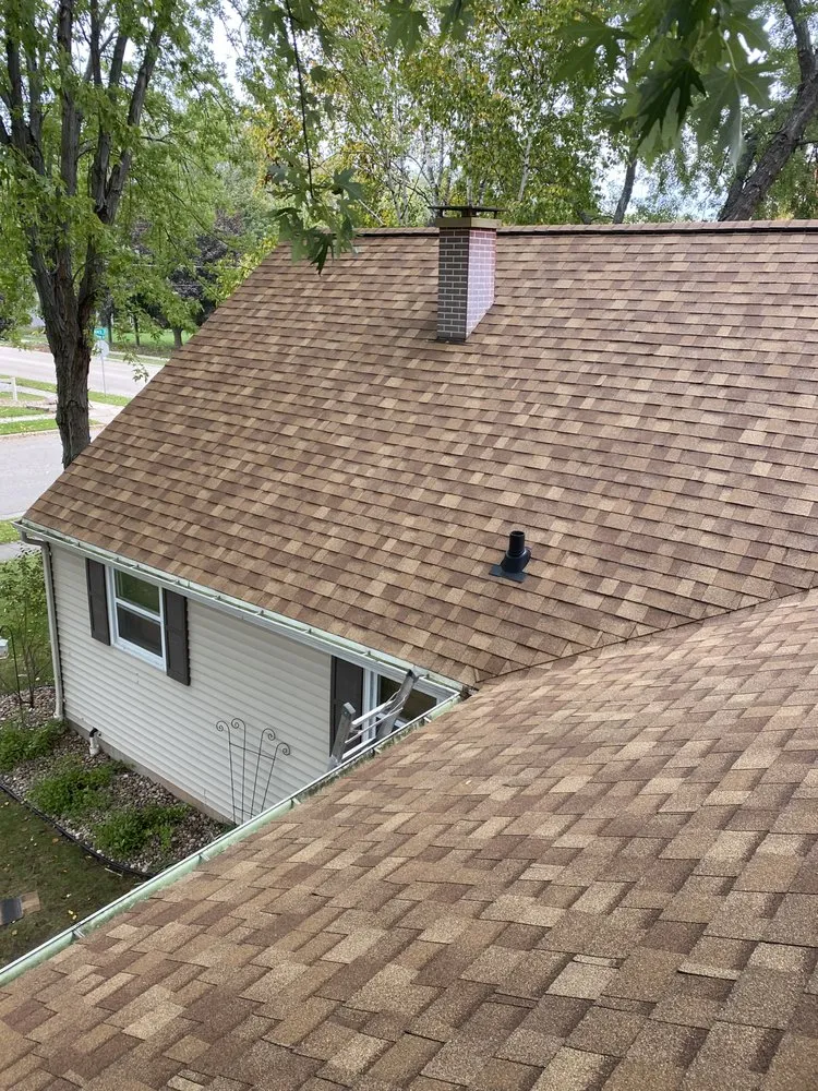 Slide of Owl Peak Roofing