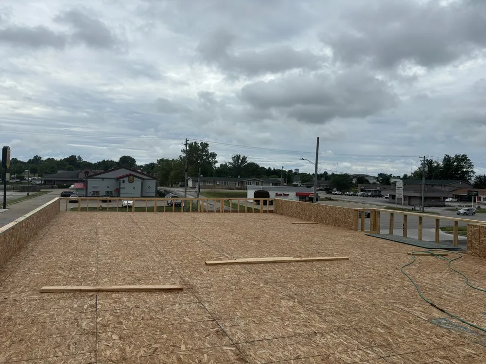 Slide of Owsley Roofing