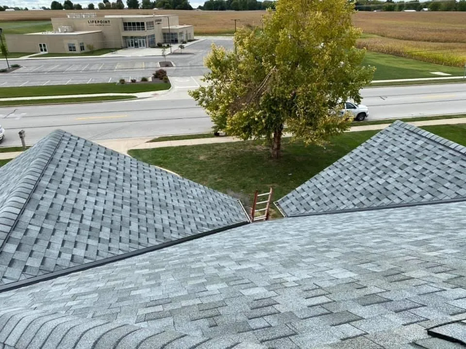 Slide of Owsley Roofing