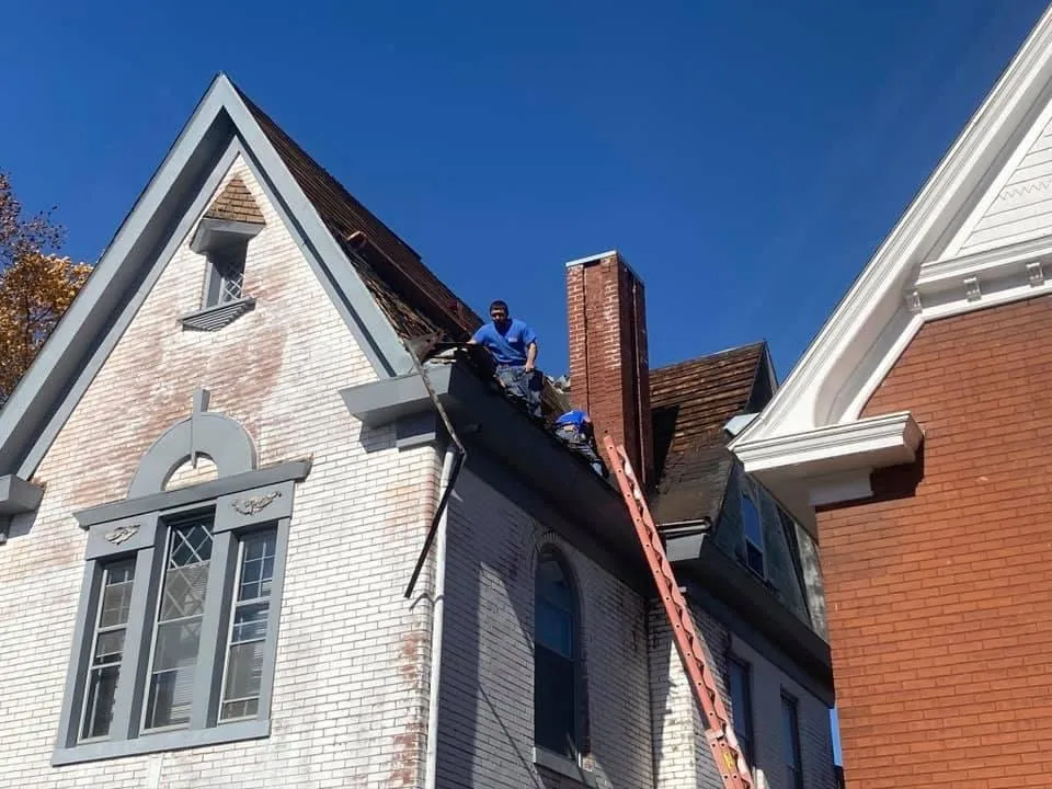 Slide of Owsley Roofing