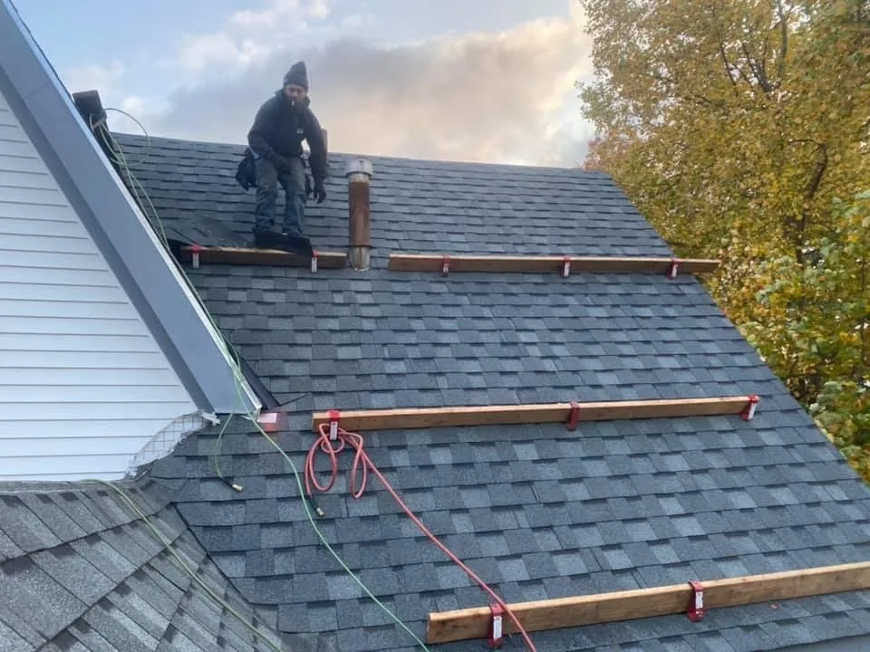 Slide of Owsley Roofing