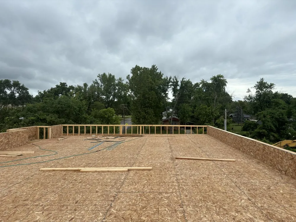 Slide of Owsley Roofing