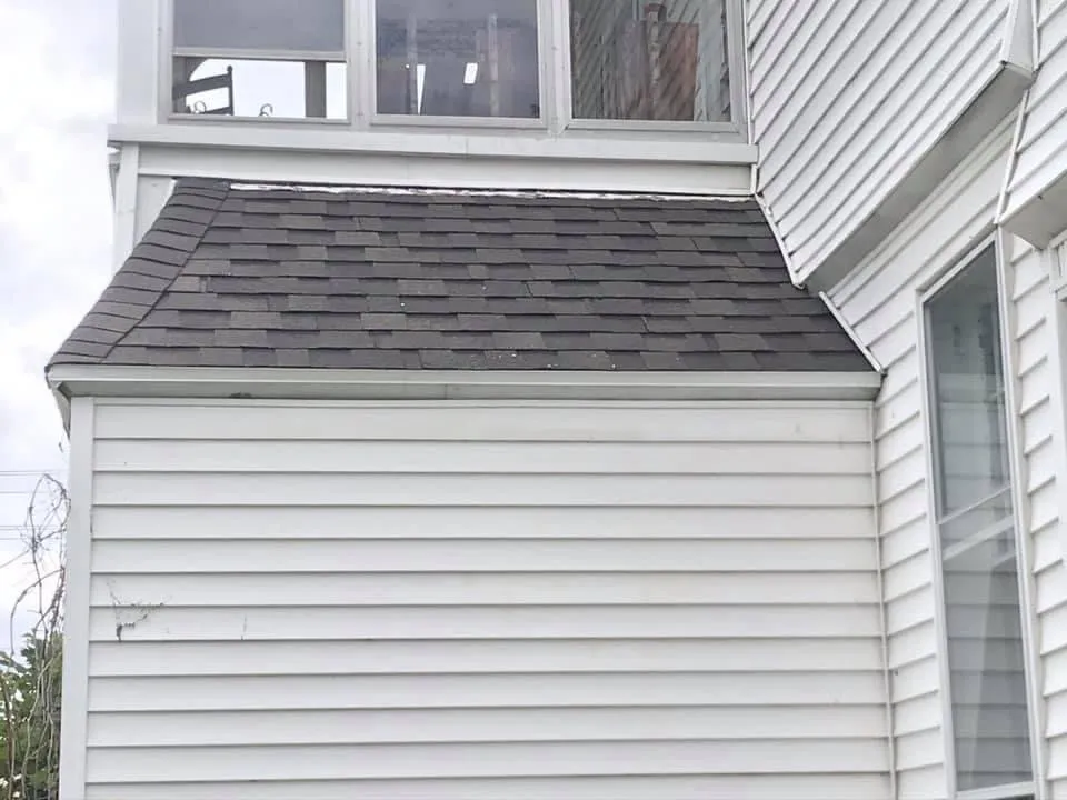 Slide of Owsley Roofing