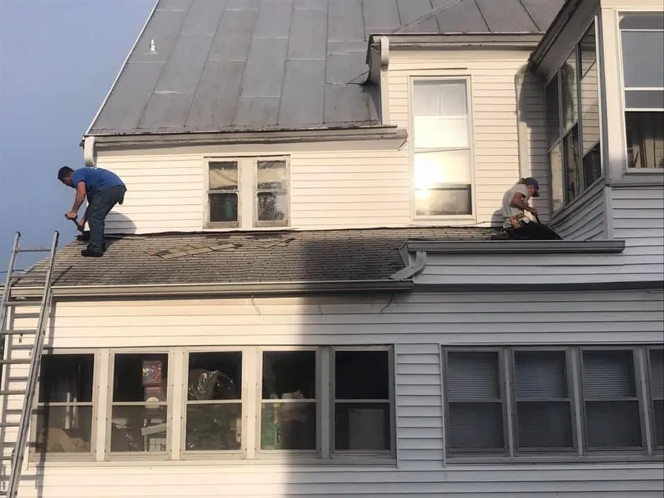 Slide of Owsley Roofing