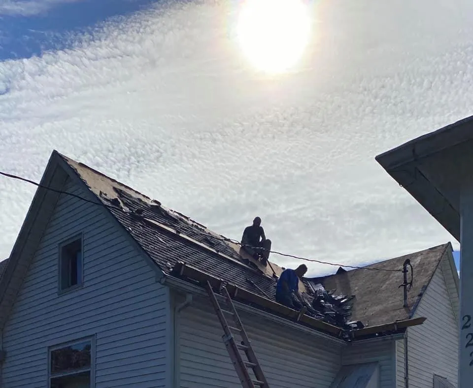 Slide of Owsley Roofing