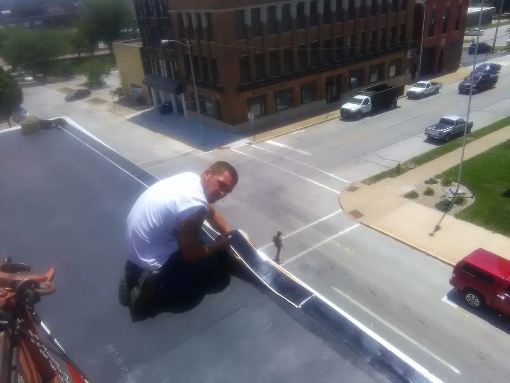 Slide of Owsley Roofing