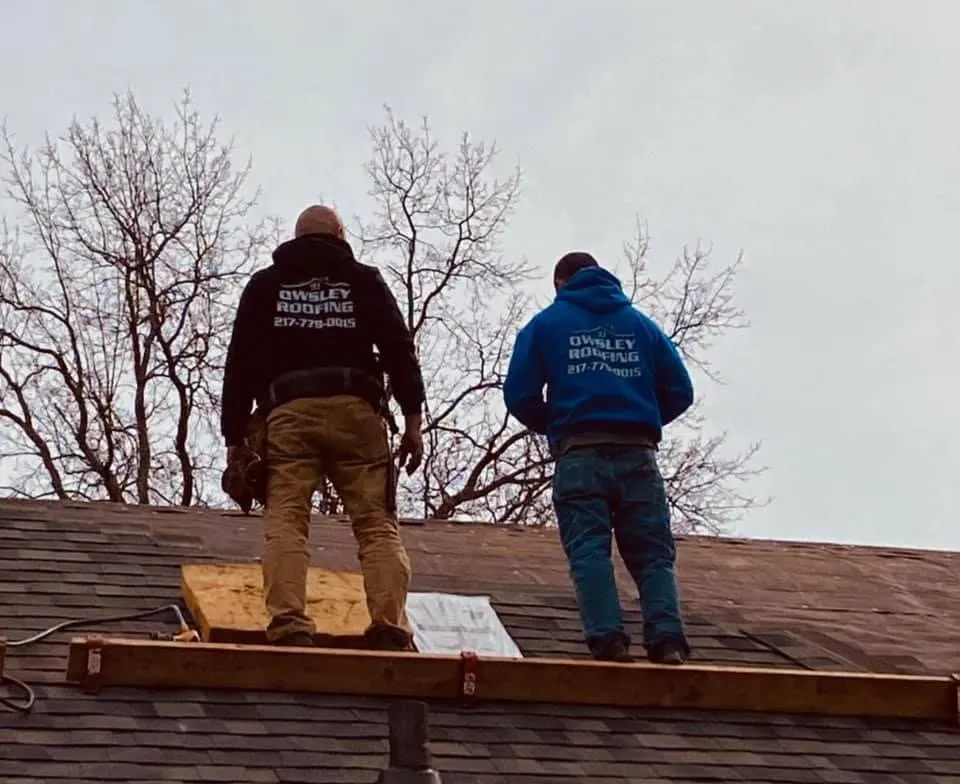 Slide of Owsley Roofing