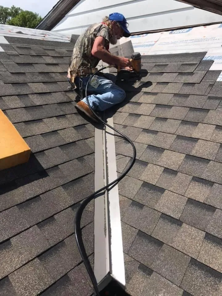 Slide of Owsley Roofing