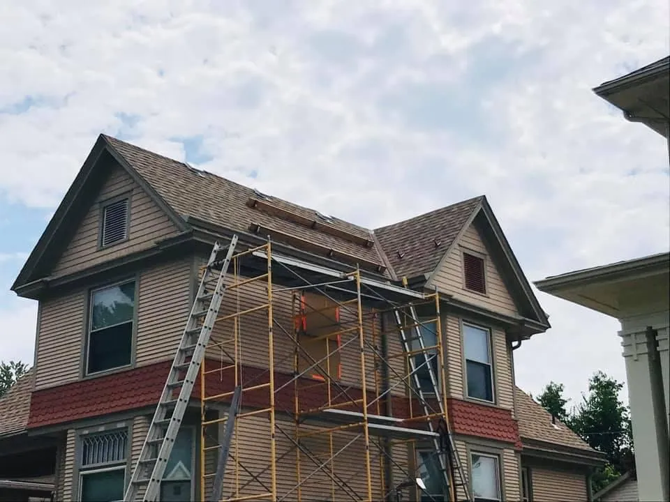 Slide of Owsley Roofing
