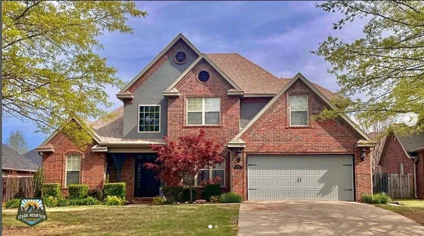 Slide of Ozark Mountain Roofing