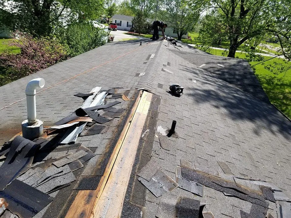 Slide of Ozark Quality Roofing