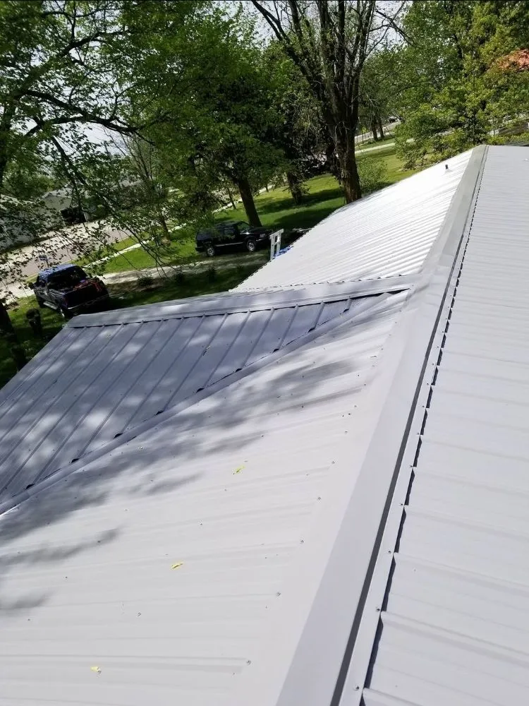 Slide of Ozark Quality Roofing