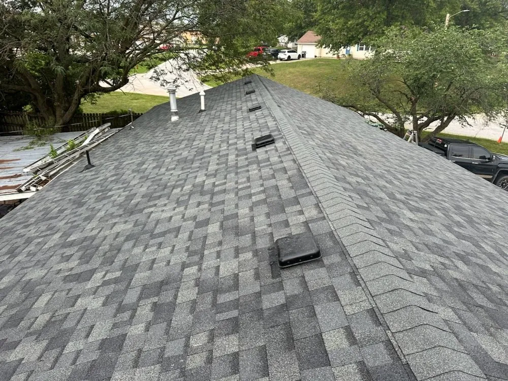 Slide of Ozark Quality Roofing