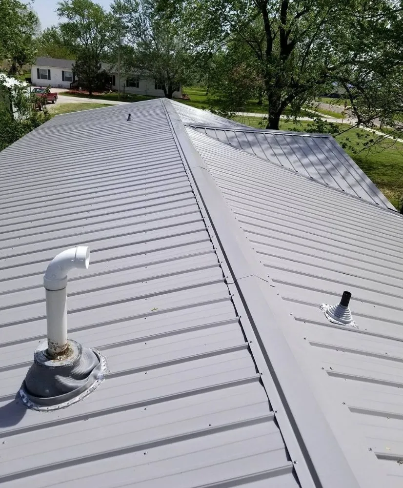 Slide of Ozark Quality Roofing