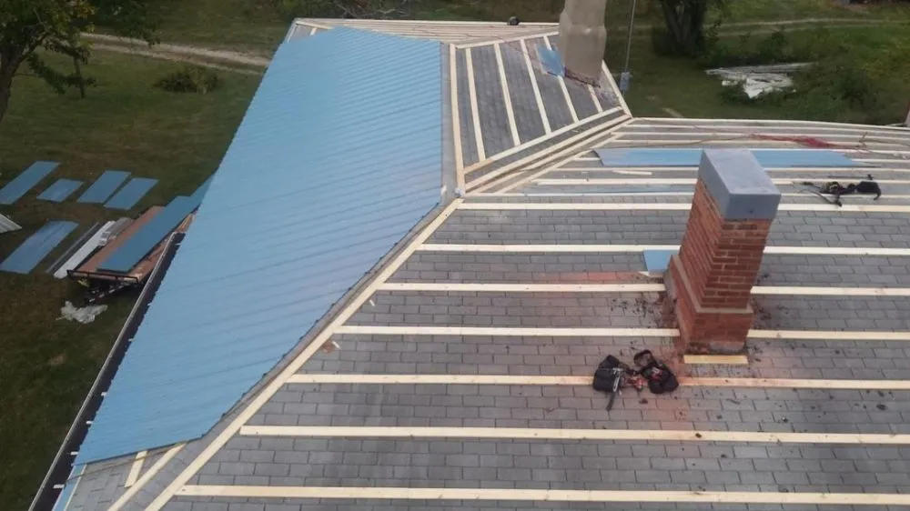 Slide of Ozark Quality Roofing