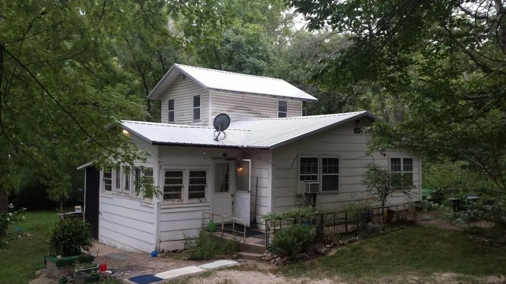 Slide of Ozark Quality Roofing