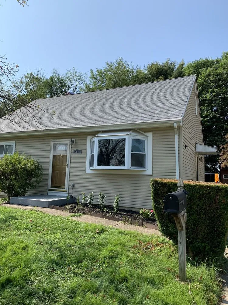 Slide of P & G Roofing