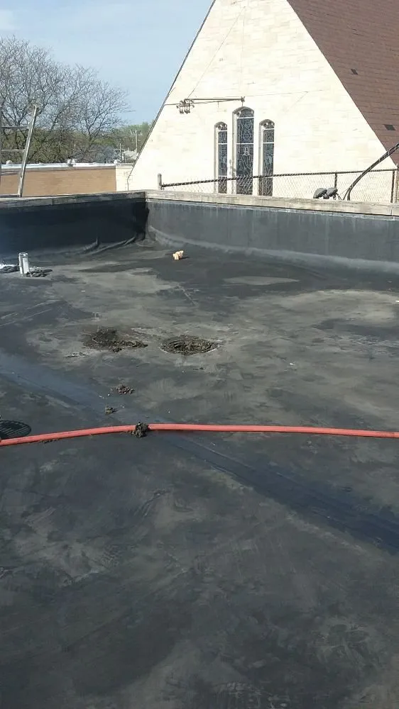 Slide of P & J Roofing