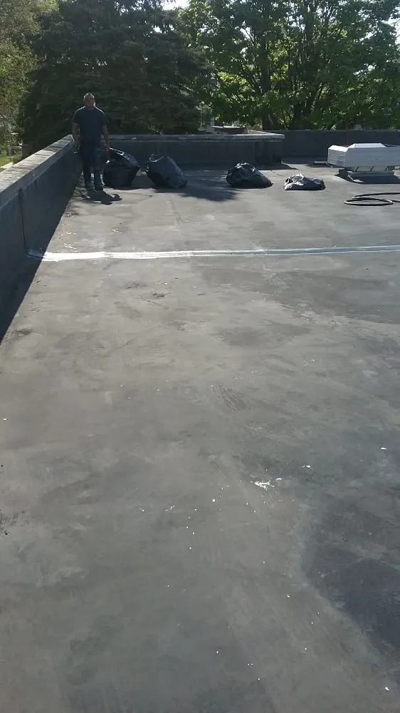 Slide of P & J Roofing