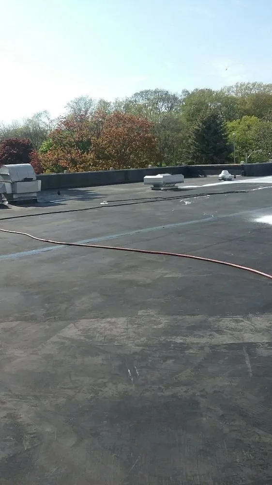 Slide of P & J Roofing