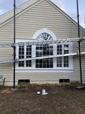 P&A Siding and Gutters Logo