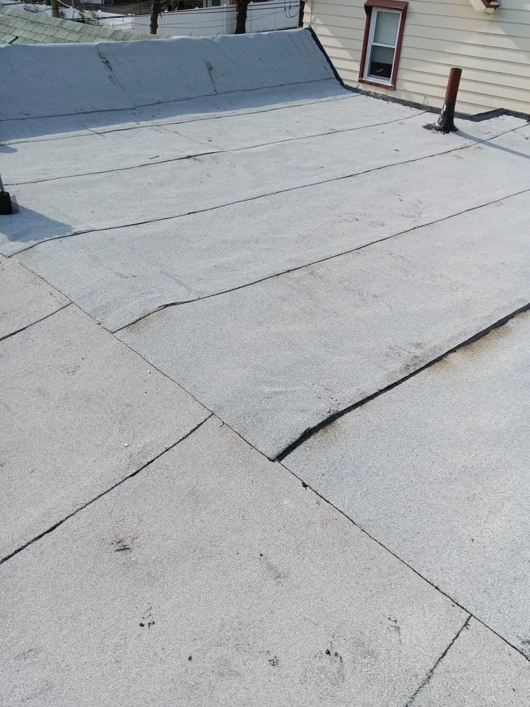 Slide of Pacheco Roofing