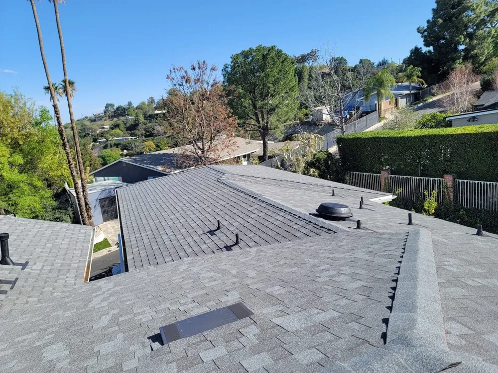 Slide of Pacific Roofers