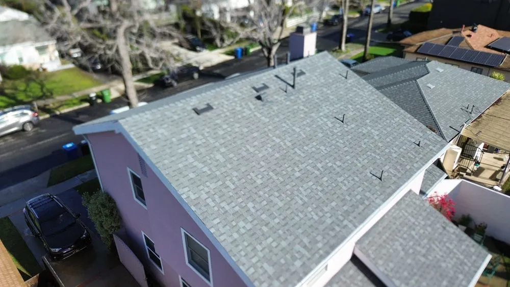 Slide of Pacific Roofers