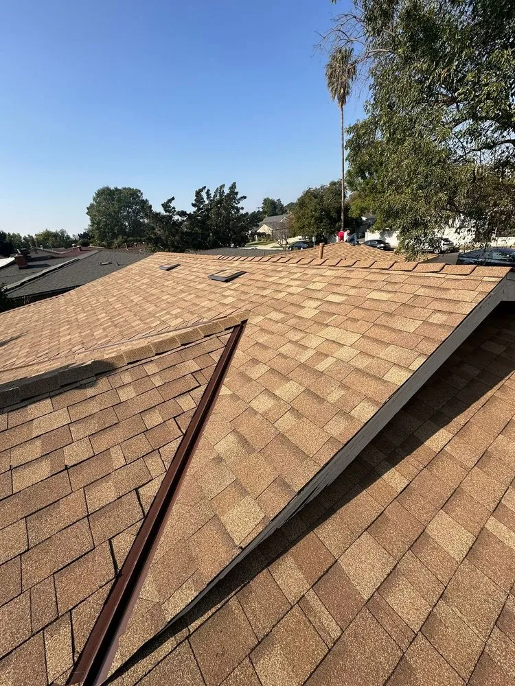 Slide of Pacific Roofers