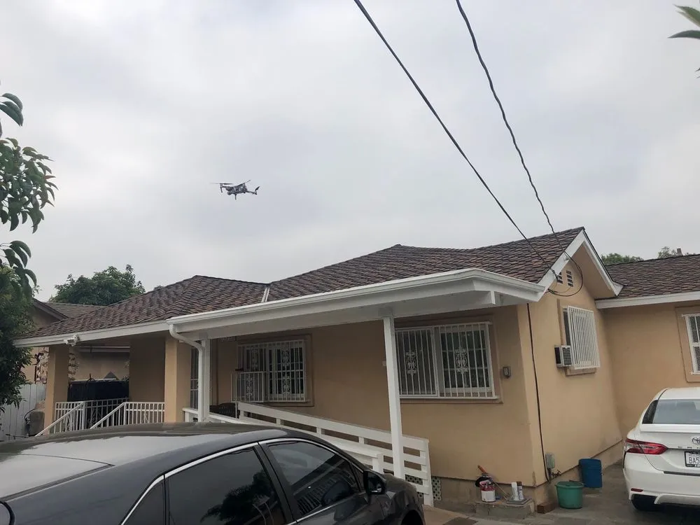 Slide of Pacific Roofing