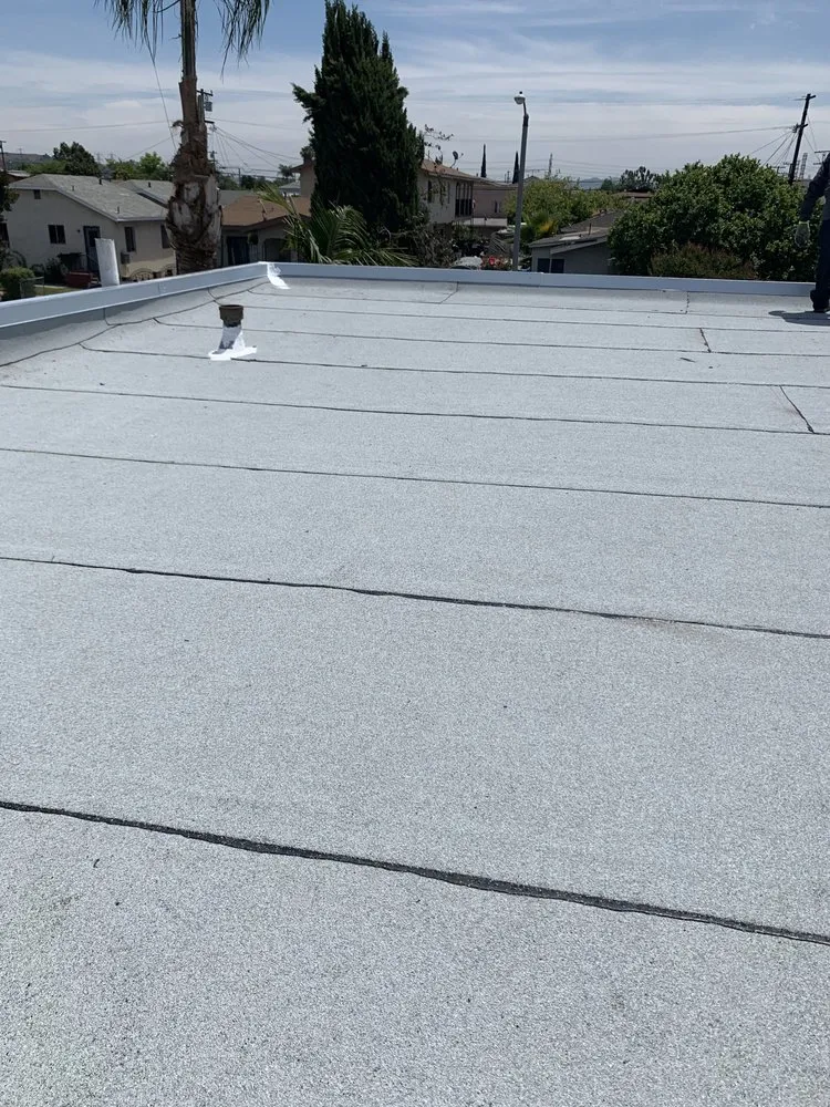 Slide of Pacific Roofing