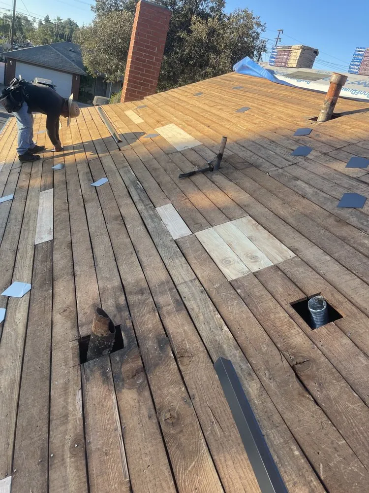 Slide of Pacific Roofing