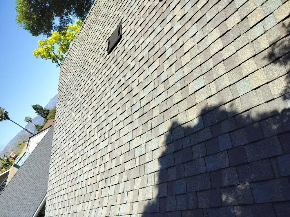 Slide of Pacific Roofing