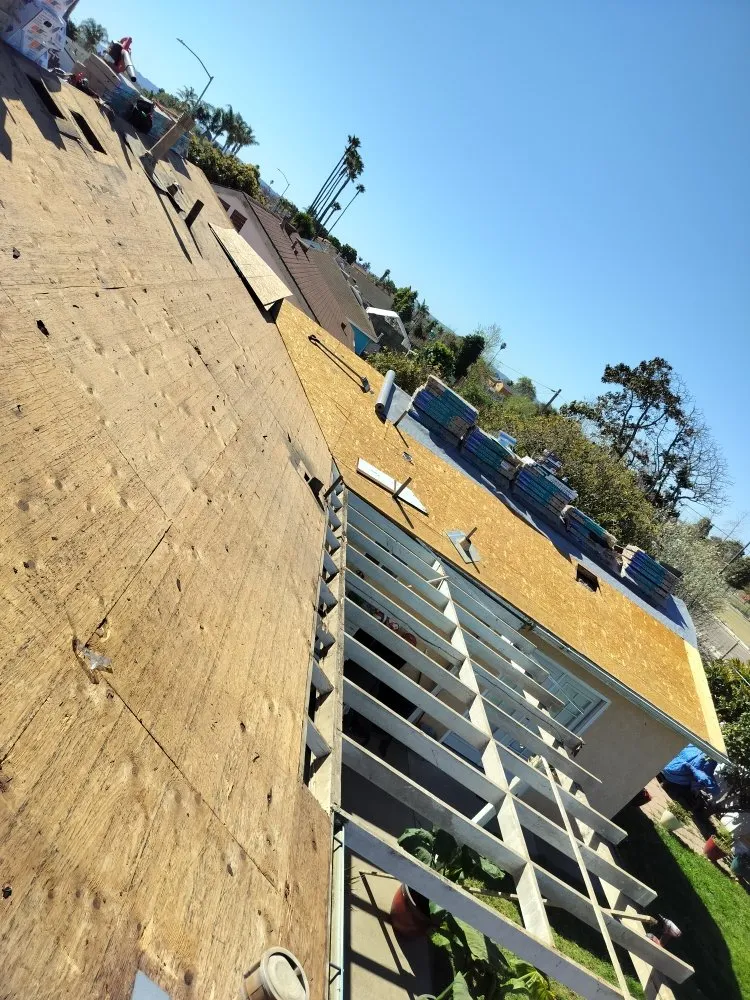 Slide of Pacific Roofing