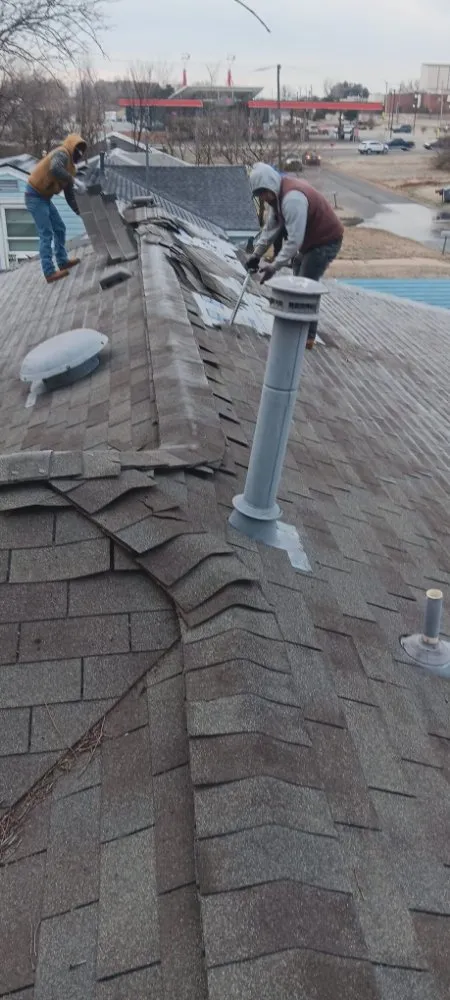 Slide of Pacific Roofing