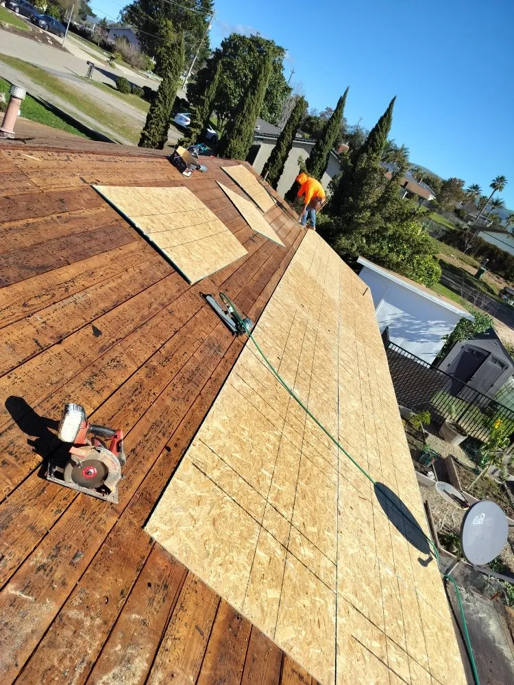Slide of Pacific Roofing