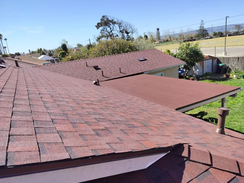 Slide of Pacific Roofing