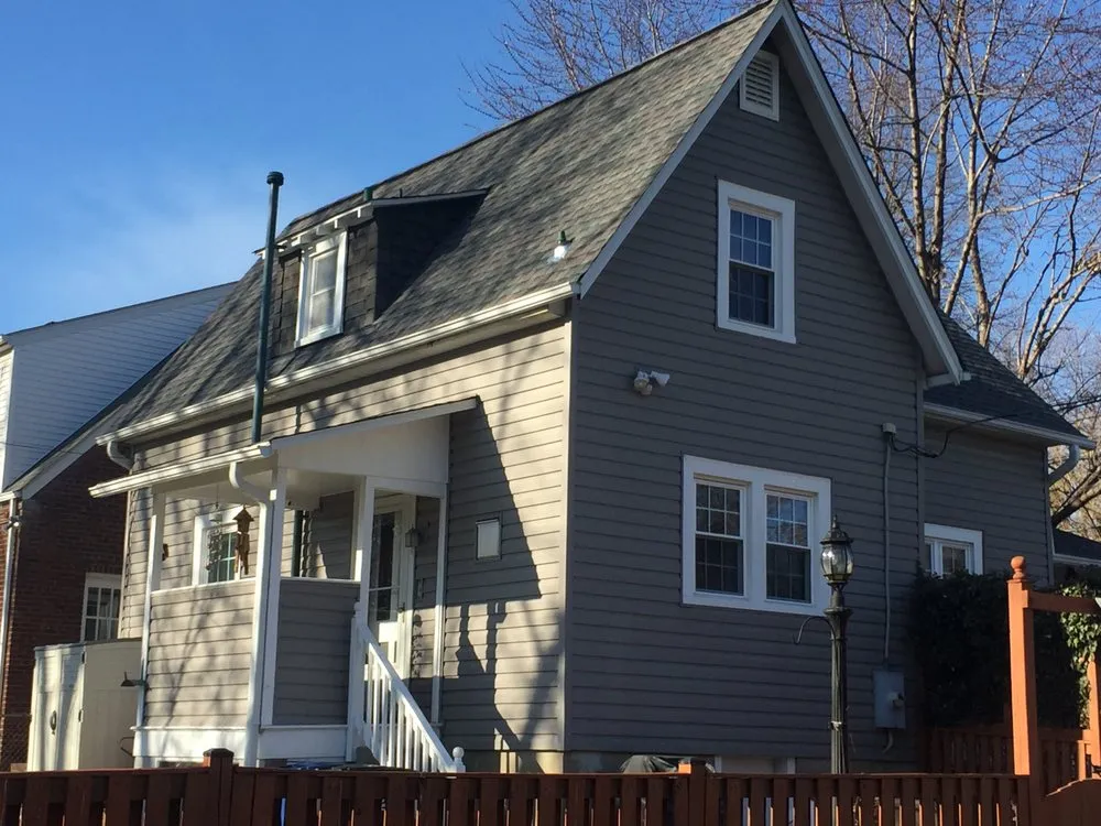 Slide of Painter Roofing and Construction