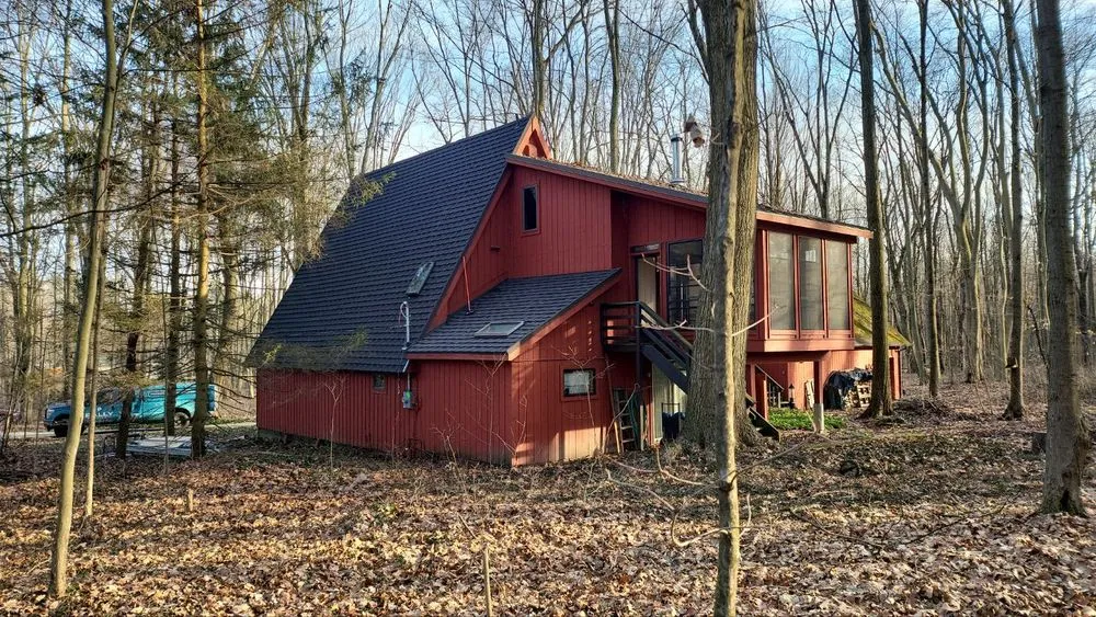 Slide of Pally Roofing