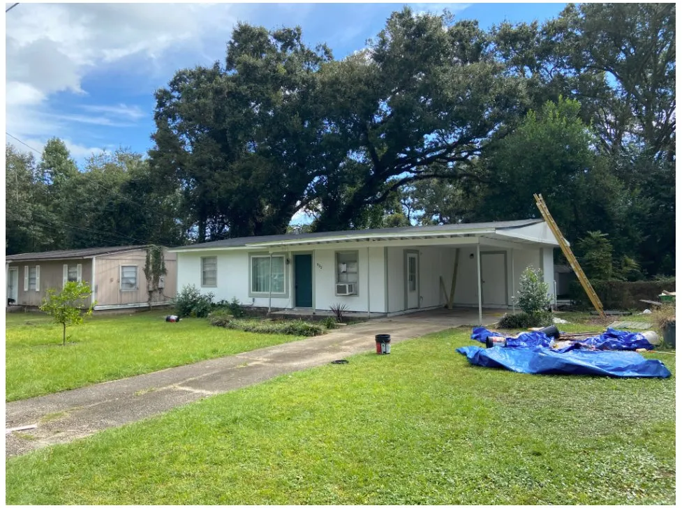 Slide of Palm Tree Roofing