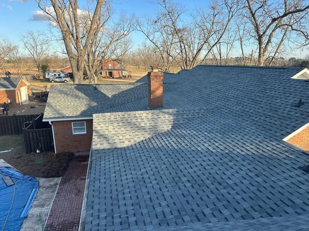 Slide of Palma's Roofing Experts