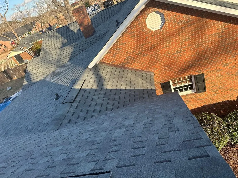 Slide of Palma's Roofing Experts