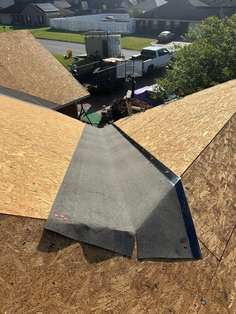 Slide of Palma's Roofing Experts