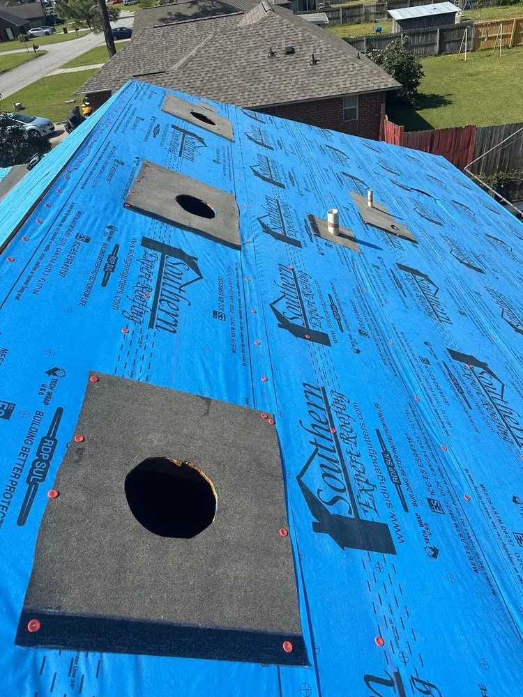 Slide of Palma's Roofing Experts