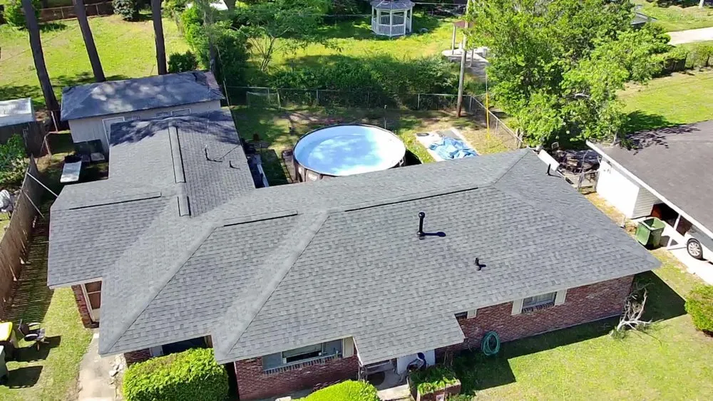 Slide of Palma's Roofing Experts