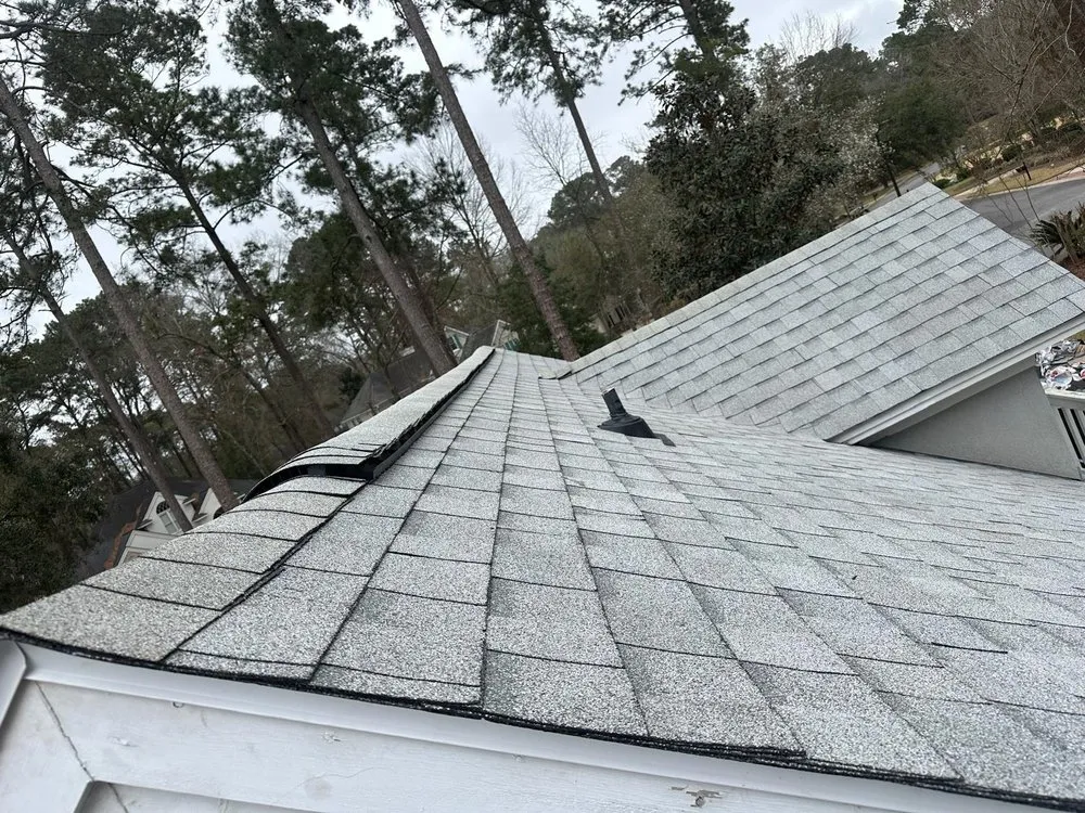 Slide of Palma's Roofing Experts